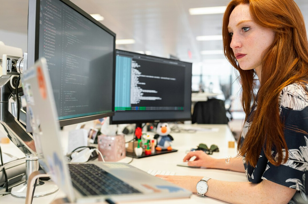 cybersecurity expert reviewing code